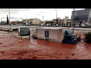 Fast-Moving Floodwater Imperils Vehicles and Passengers on Highway Outside Athens