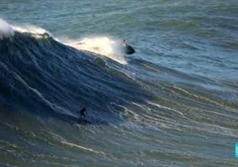 Surfers Enjoy Huge Waves in Nazare