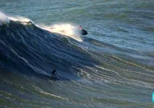Surfers Enjoy Huge Waves in Nazare