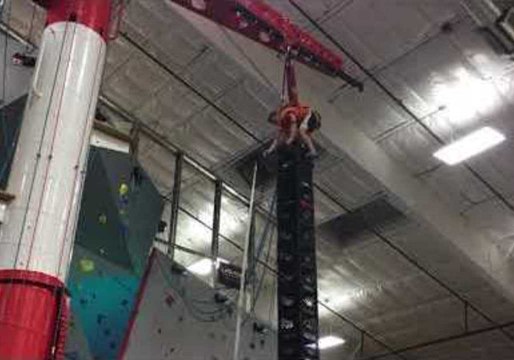 Kid Bravely Balances on Milk Crates for Epic Challenge