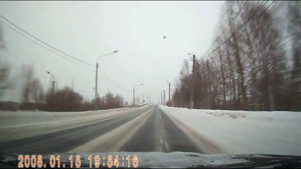 Sliding Truck Nearly Hits Car