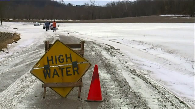 Teacher Saves Neighbor's Life After SUV Crashes into Icy Creek