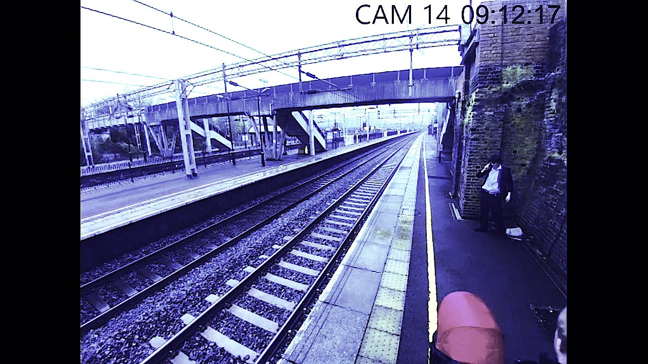 Brave Woman Saves Man from Jumping in Front of Train