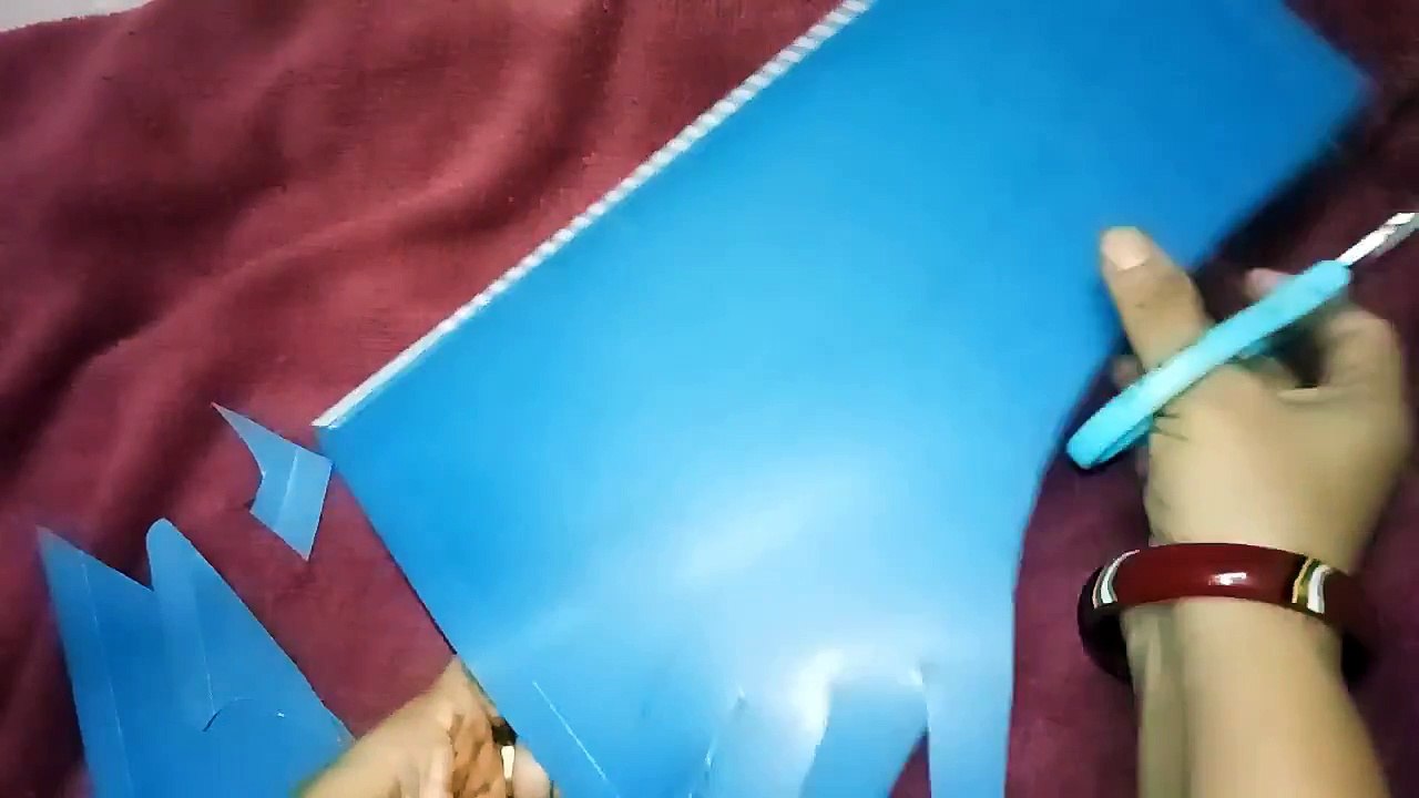 Make practice hand for mehndi practice by useless folder, (You can also use any thick plastic sheet)