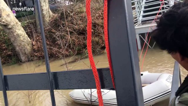 Office workers use boat to reach office