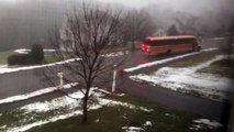 School bus slides down icy road during morning pickup
