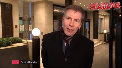 COUPLE ARGUING IN BACKGROUND OF LIVE NEWS REPORT UNCENSORED