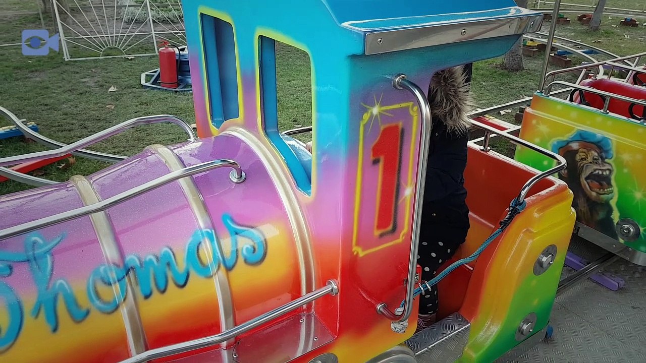 Toy train going round and round in the park Fun  Playground for Kids