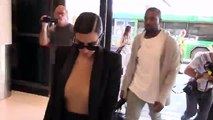 Kim Kardashian Is Dressed For Perfection While Kanye Goes Casual [2014]
