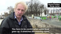 Paris flooding: barges on the Seine in trouble
