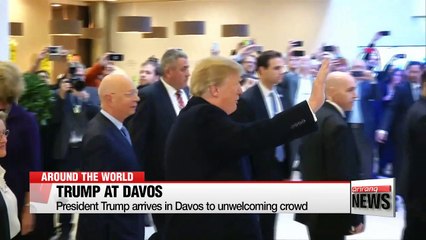 Trump arrives in Davos to unwelcoming crowd