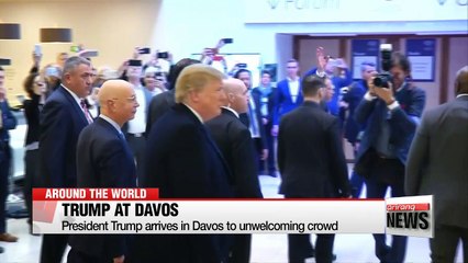Trump arrives in Davos to unwelcoming crowd