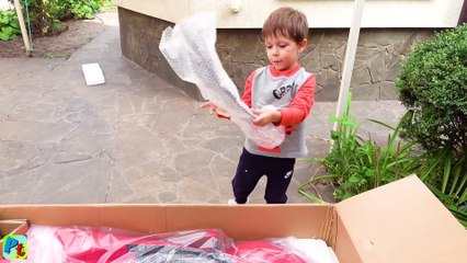 Unboxing Power Wheels ride on Ferrari Family Fun Playtime Surprise toys video for kids