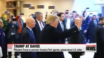 Trump arrives in Davos to unwelcoming crowd