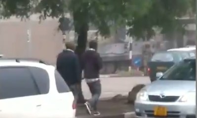 Military Vehicle Blocks Street in Harare