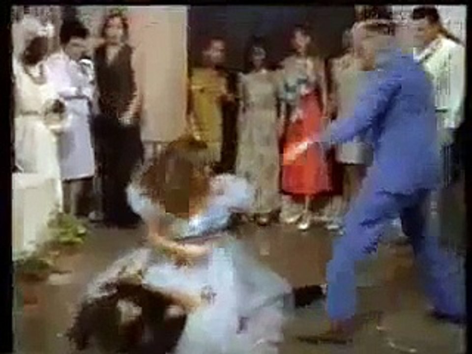 Heroine knocks out and humiliates dark haired beautiful girl
