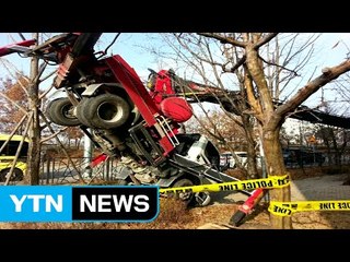아파트 벽 보수 작업하던 크레인 추락...2명 부상 / YTN (Yes! Top News)