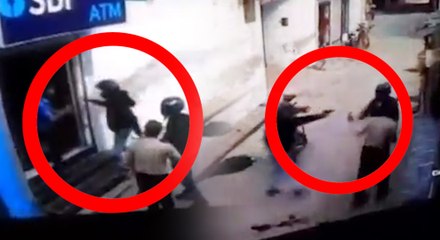 துப்பாக்கியால் சுட்ட பிறகும் கொள்ளையர்களை தடுத்த ஏடிஎம் காவலாளி! திக், திக் வீடியோ