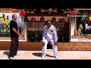 Martial art background exercise - squats, push ups, kettlebell pull ups