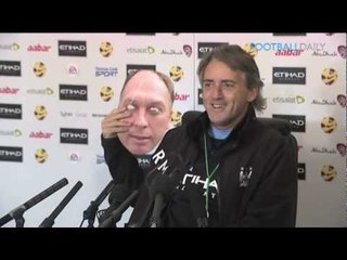 Mancini wears mask at press conference