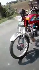 A desi baba travling on baike in amazing  way