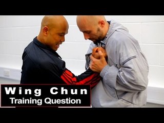 Wing Chun training - wing chun how to reverse chest grab Q57