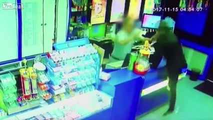 Download Video: Shopkeeper fights off knife-wielding masked robber