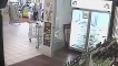 Thief gets instant karma after stealing woman's handbag-smashes glass door