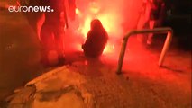 Woman struck by lit flare during Greek protest (warning: graphic content)