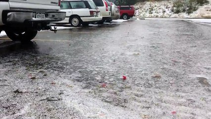 Marble-Sized Hail Bobbles Atop Floodwater in Durango, Colorado-ksV8pBHkadc