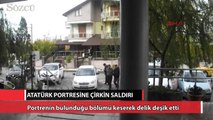 Atatürk portresine bıçaklı saldırı