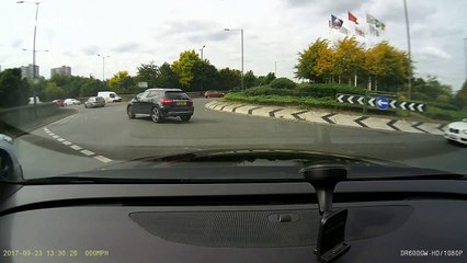 Maintenance workers parked on roundabout nearly cause crash