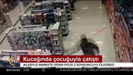 Kucağında çocuğuyla çatıştı