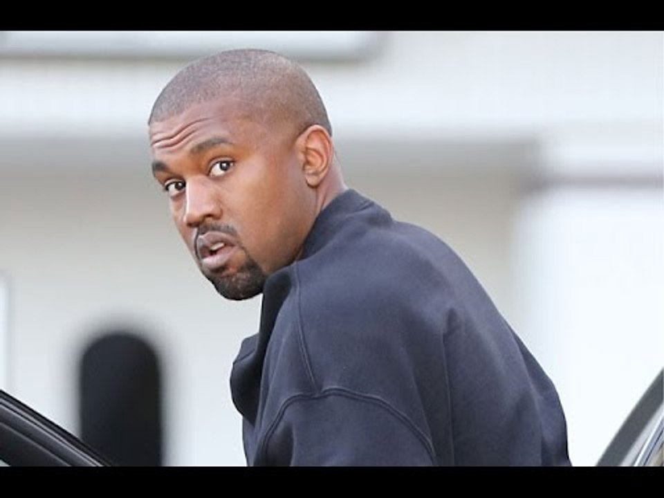 Crazed Kanye West Wears Bullet Proof Vest Out To Dinner!