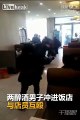 Two drunk men enter a hotel and start hitting each other with weapons