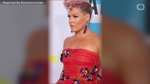 Pink Performs On The Side Of A Building At AMAs