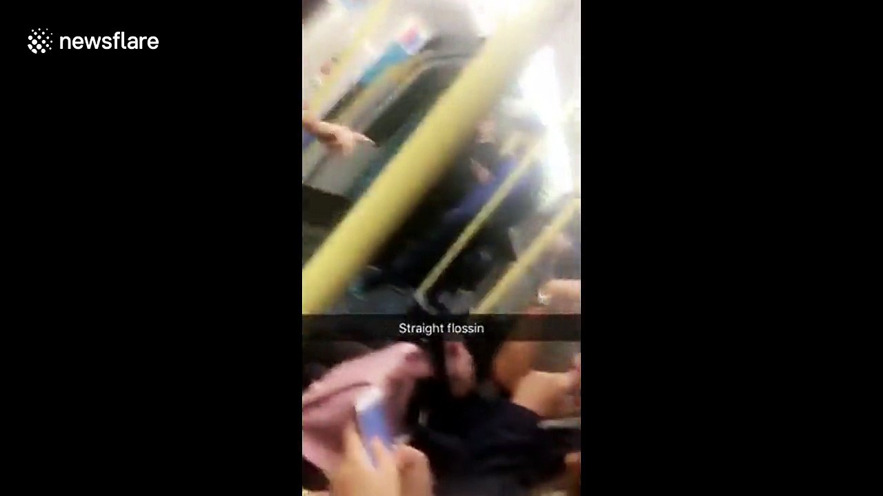 Girls drink beer and pole dance on London Underground