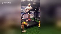 US soccer coach demonstrates amazing dribbling skills on treadmill