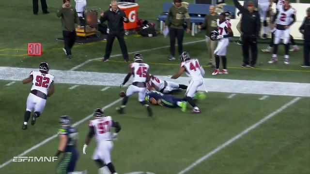 Russell Wilson throws interception to Desmond Trufant, then chases him down