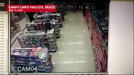 Military police officer fatally shoots robbers while holding baby in Brazil