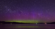 Timelapse Captures Shooting Stars Streaking Over Aurora-Filled Night Sky