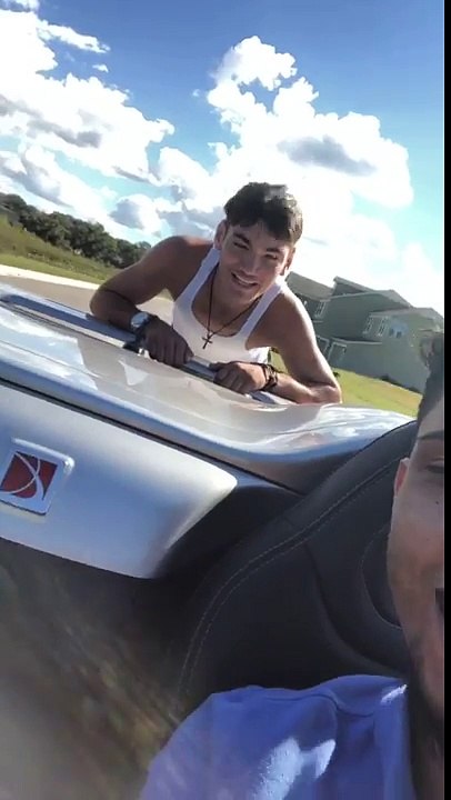 Skate boarding while holding on to a car fail