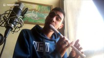 Egyptian musician beat boxes while playing the recorder