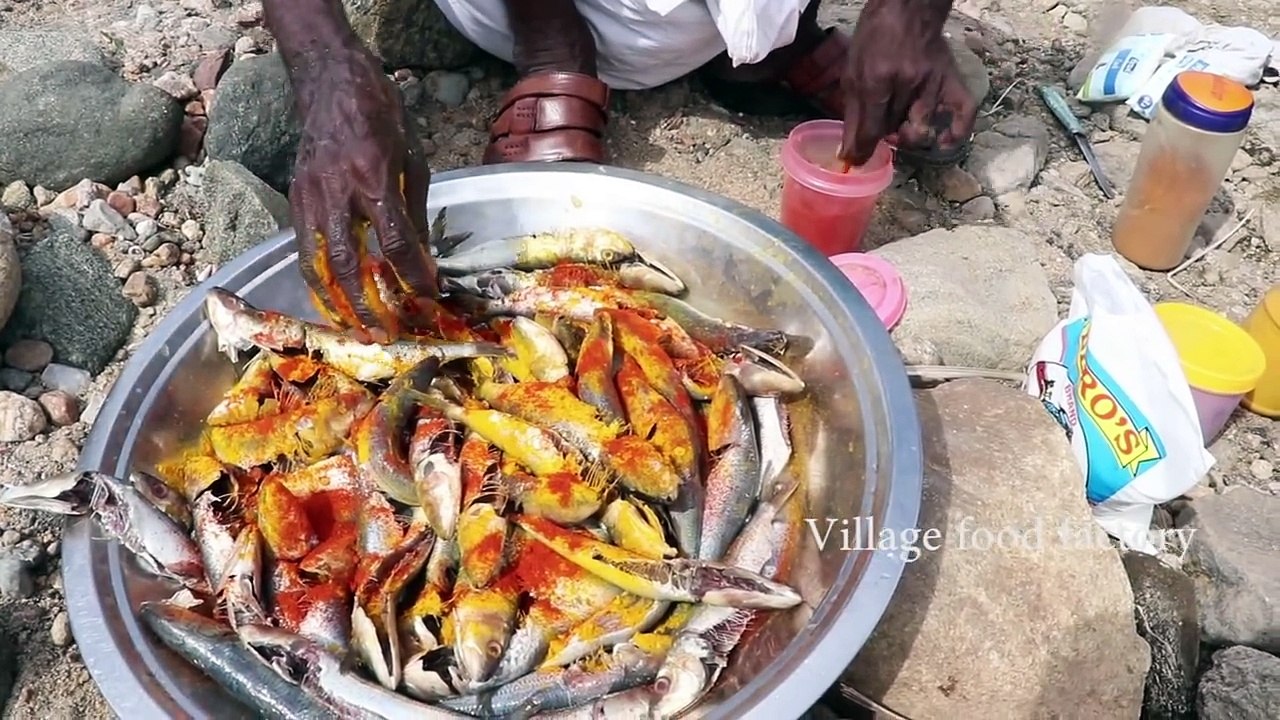 Traditional style fire fish prepared by my daddy / Village food factory