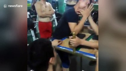 Sickening moment man breaks bone in arm wrestle