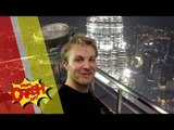 Nico Rosberg climbs the KL's Petronas Twin Towers