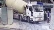 Cement truck falls down in a big hole