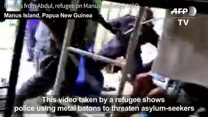 Baton-wielding police clear closed Australia refugee camp in PNG