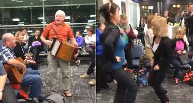 Newfoundland flight passengers turn delayed flight into huge sing-a-long At Toronto airport