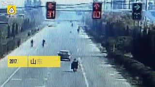 Woman on a scooter crashes into a car and flips 540 degrees